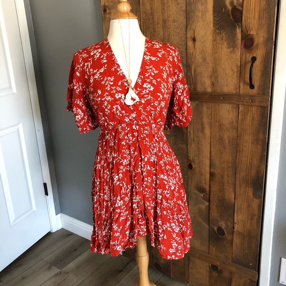 Flirty summer dress with back tie and high waste- very flattering! Size Large.